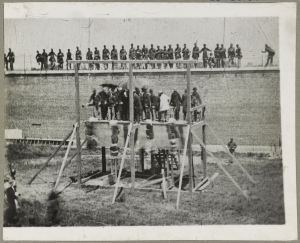 Hanging the conspirators: the drop. Photo by Alexander Gardner, 1865; Library of Congress Prints and Photographs Division, public domain