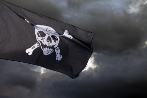 Jolly Roger against storm clouds