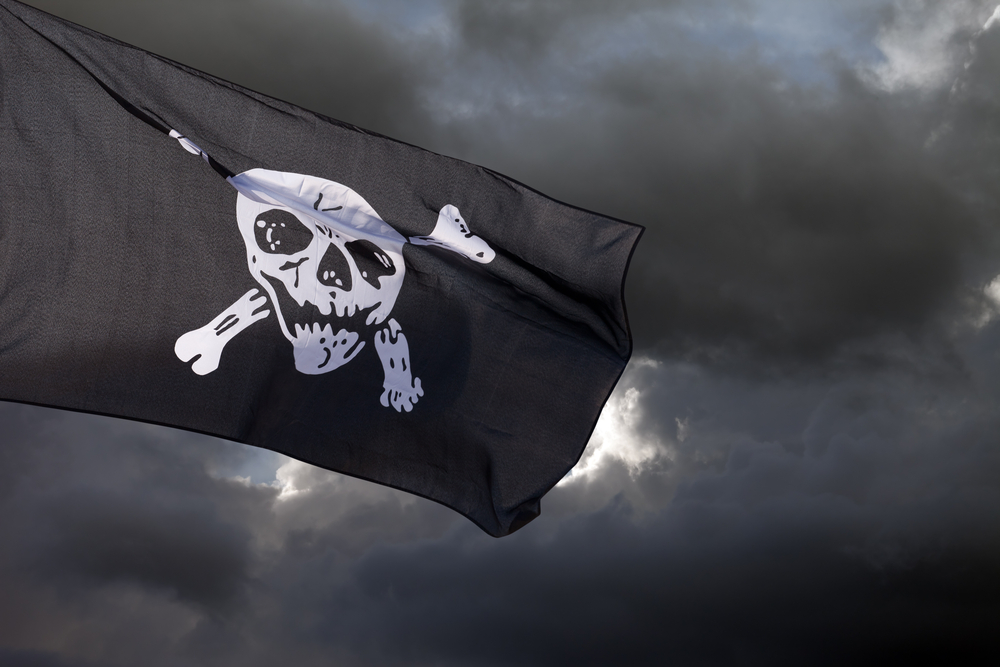 Jolly Roger against storm clouds