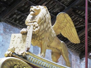 The winged lion of Venice on the bow of the royal barge.