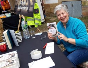 Ann Marie Ackermann selling books at the Buchhandlung Taube in Brackenheim.